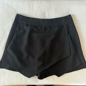 Black mini shorts/skirt size small